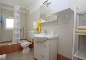 Koupelna v ubytování Apartments Zak