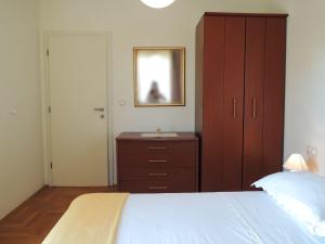 Posteľ alebo postele v izbe v ubytovaní Apartments Lada