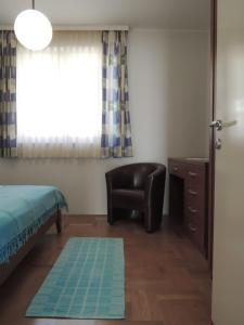 Posteľ alebo postele v izbe v ubytovaní Apartments Lada