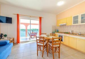 Kuchyň nebo kuchyňský kout v ubytování Apartments Zak