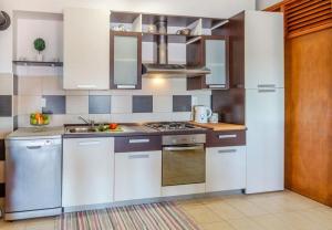 Kuchyň nebo kuchyňský kout v ubytování Apartments Zak
