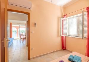 Postel nebo postele na pokoji v ubytování Apartments Zak