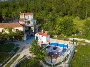 an aerial view of a house with a swimming pool at House Tonci in Tučepi