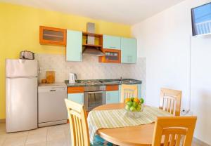 Kuchyň nebo kuchyňský kout v ubytování Apartments Zak