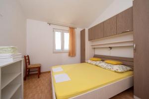 Posteľ alebo postele v izbe v ubytovaní Apartments Ruzica