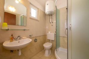 Kúpeľňa v ubytovaní Apartments Ruzica + 37 fotografií