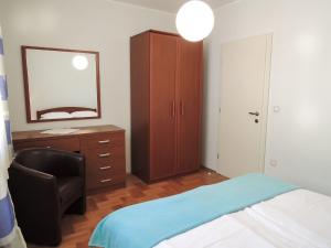 Posteľ alebo postele v izbe v ubytovaní Apartments Lada