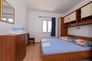 Posteľ alebo postele v izbe v ubytovaní Apartments Ruzica