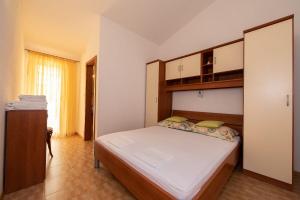 Posteľ alebo postele v izbe v ubytovaní Apartments Ruzica