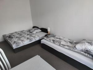 Postel nebo postele na pokoji v ubytování Willa LiMoni