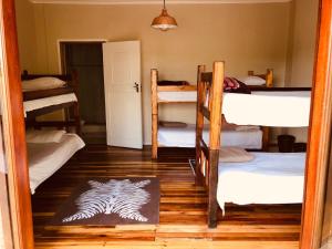 Postel nebo postele na pokoji v ubytování Island Vibe Knysna