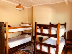 Postel nebo postele na pokoji v ubytování Island Vibe Knysna