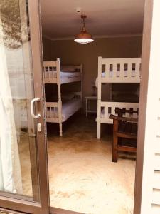 Postel nebo postele na pokoji v ubytování Island Vibe Knysna