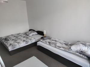Postel nebo postele na pokoji v ubytování Willa LiMoni