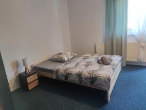 Postel nebo postele na pokoji v ubytování Willa LiMoni