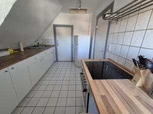 Kuchyň nebo kuchyňský kout v ubytování Gästehaus bed & kitchen
