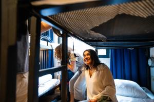 Postel nebo postele na pokoji v ubytování Bud Gett Hostels