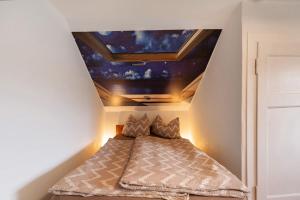 Postel nebo postele na pokoji v ubytování Ferienwohnung im Rosenberg