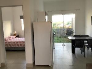 Ένα ή περισσότερα κρεβάτια σε δωμάτιο στο Casas RIO-MAR
