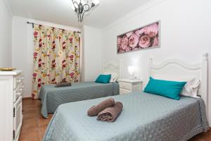 Łóżko lub łóżka w pokoju w obiekcie Apartment Limonade Deluxe Main Center Playa Blanca By PVL