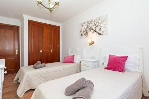 Łóżko lub łóżka w pokoju w obiekcie Apartment Limonade Deluxe Main Center Playa Blanca By PVL