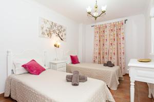 Łóżko lub łóżka w pokoju w obiekcie Apartment Limonade Deluxe Main Center Playa Blanca By PVL