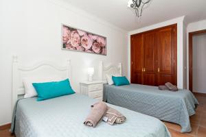 Łóżko lub łóżka w pokoju w obiekcie Apartment Limonade Deluxe Main Center Playa Blanca By PVL