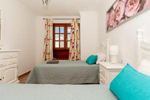 Łóżko lub łóżka w pokoju w obiekcie Apartment Limonade Deluxe Main Center Playa Blanca By PVL
