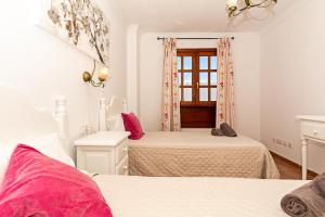Łóżko lub łóżka w pokoju w obiekcie Apartment Limonade Deluxe Main Center Playa Blanca By PVL