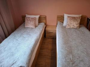 Postel nebo postele na pokoji v ubytování Luna