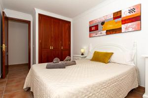 Łóżko lub łóżka w pokoju w obiekcie Apartment Limonade Deluxe Main Center Playa Blanca By PVL