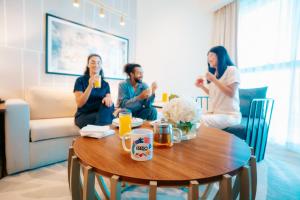 Os clientes hospedados em Adagio Premium The Palm