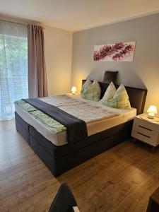 Postel nebo postele na pokoji v ubytování Alpe-Adria Apartments Chanel top12