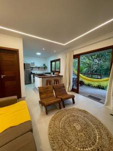 Χώρος καθιστικού στο Vila de Iyá, Barra Grande - 350m da praia
