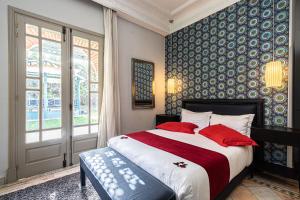 Voodi või voodid majutusasutuse Villa palmeraie marrakech toas +137 fotot