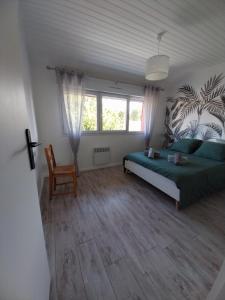 Ένα ή περισσότερα κρεβάτια σε δωμάτιο στο Villa Nana