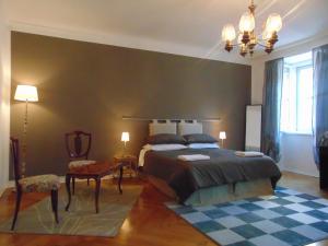 Un pat sau paturi într-o cameră la Affittacamere San Lazzaro