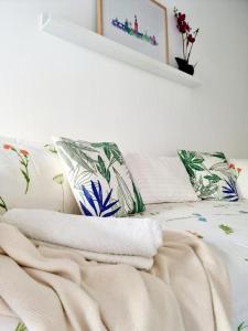 Posteľ alebo postele v izbe v ubytovaní Hostfy Mercado de Triana
