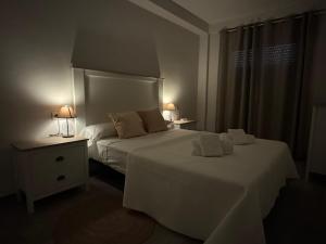 Posteľ alebo postele v izbe v ubytovaní Apartamento La Verdad