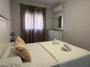 Posteľ alebo postele v izbe v ubytovaní Apartamento La Verdad