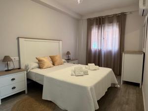 Posteľ alebo postele v izbe v ubytovaní Apartamento La Verdad