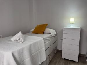 Posteľ alebo postele v izbe v ubytovaní Apartamento La Verdad