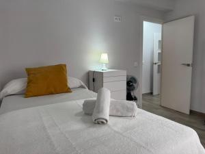 Posteľ alebo postele v izbe v ubytovaní Apartamento La Verdad