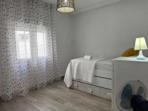 Posteľ alebo postele v izbe v ubytovaní Apartamento La Verdad