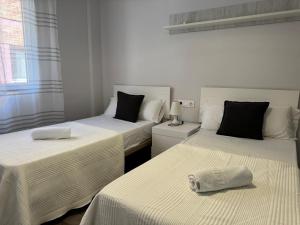 Posteľ alebo postele v izbe v ubytovaní Apartamento La Verdad