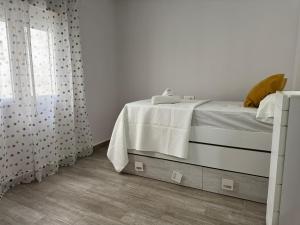 Posteľ alebo postele v izbe v ubytovaní Apartamento La Verdad