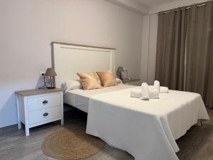 Posteľ alebo postele v izbe v ubytovaní Apartamento La Verdad