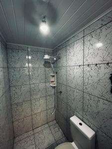 Ένα μπάνιο στο Chalés Recanto da Aldeia