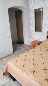 a bedroom with a bed with spiders on it at Комфортная квартира в тихом центре in Izmail