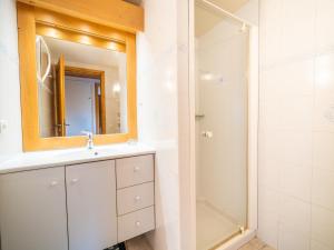 a bathroom with a sink and a shower at Appartement 3 chambres avec terrasse, centre village, piste et commerces à pied, garage et WIFI - FR-1-437-104 in La Clusaz